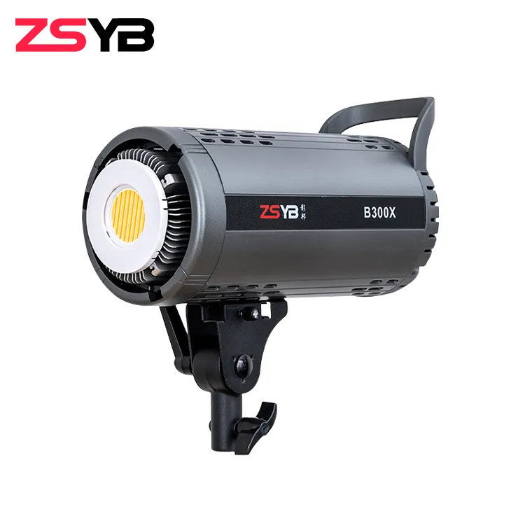 B300X LED – מנורת LED מקצועי לצילום ווידאו. הספק 300 וואט, תאורה COB חזק. איכות גבוהה, מתאים לסטודיו ולצלמים מקצועיים. B300X LED – מנורת LED מקצועי לצילום ווידאו. הספק 300 וואט, תאורה COB חזק. איכות גבוהה, מתאים לסטודיו ולצלמים מקצועיים.