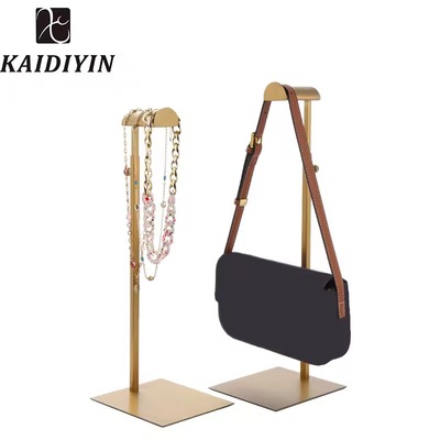 מעמד לצילום תיקים ואביזרים